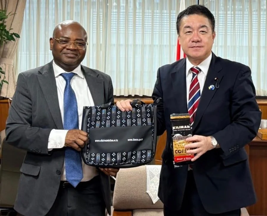 Hon. Prof. Kitila Mkumbo handing over an Ella workshop bag during his investment mission to Japan